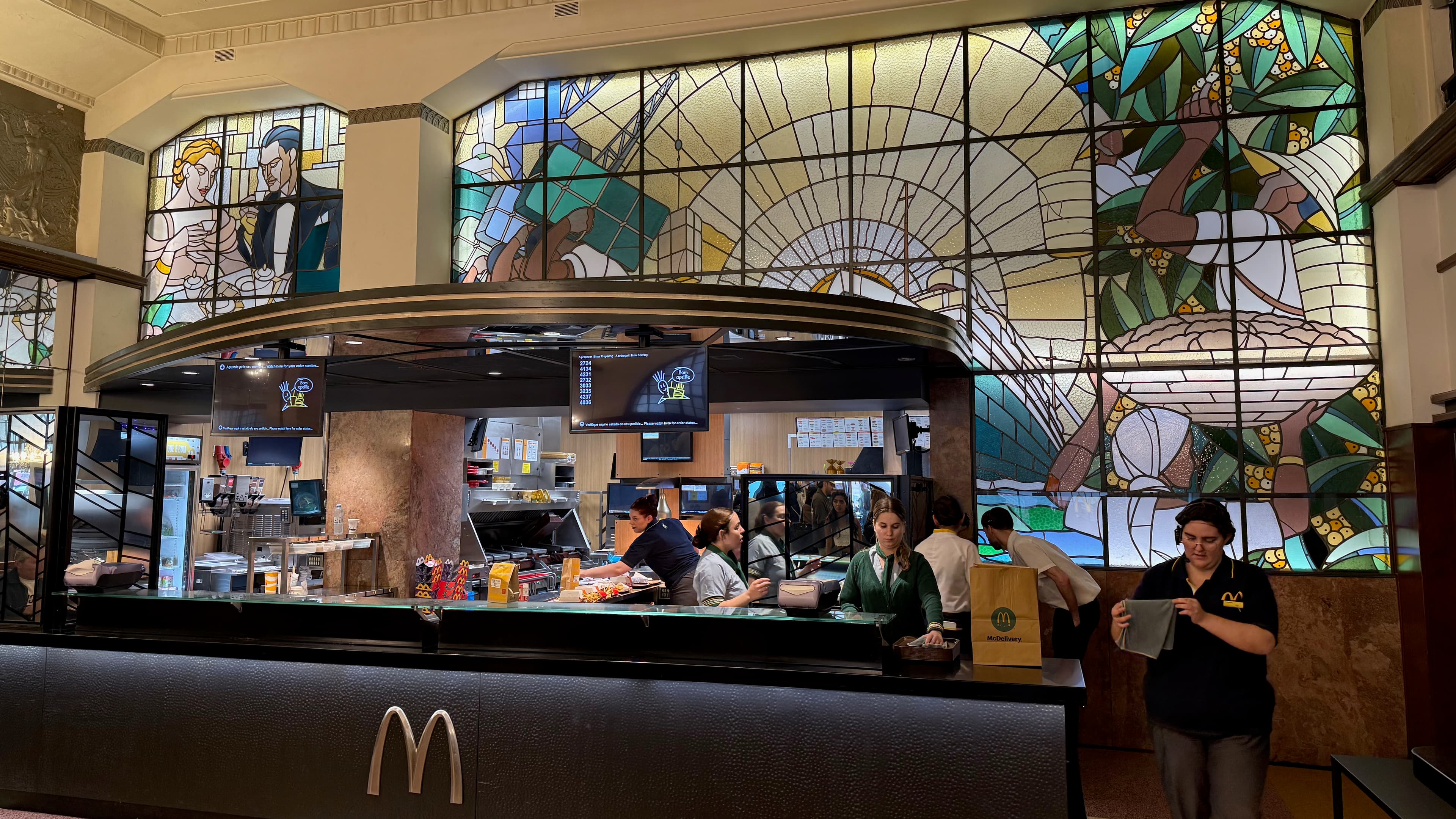 Beautiful, massive stained glass panels decorating the back wall of the service area.