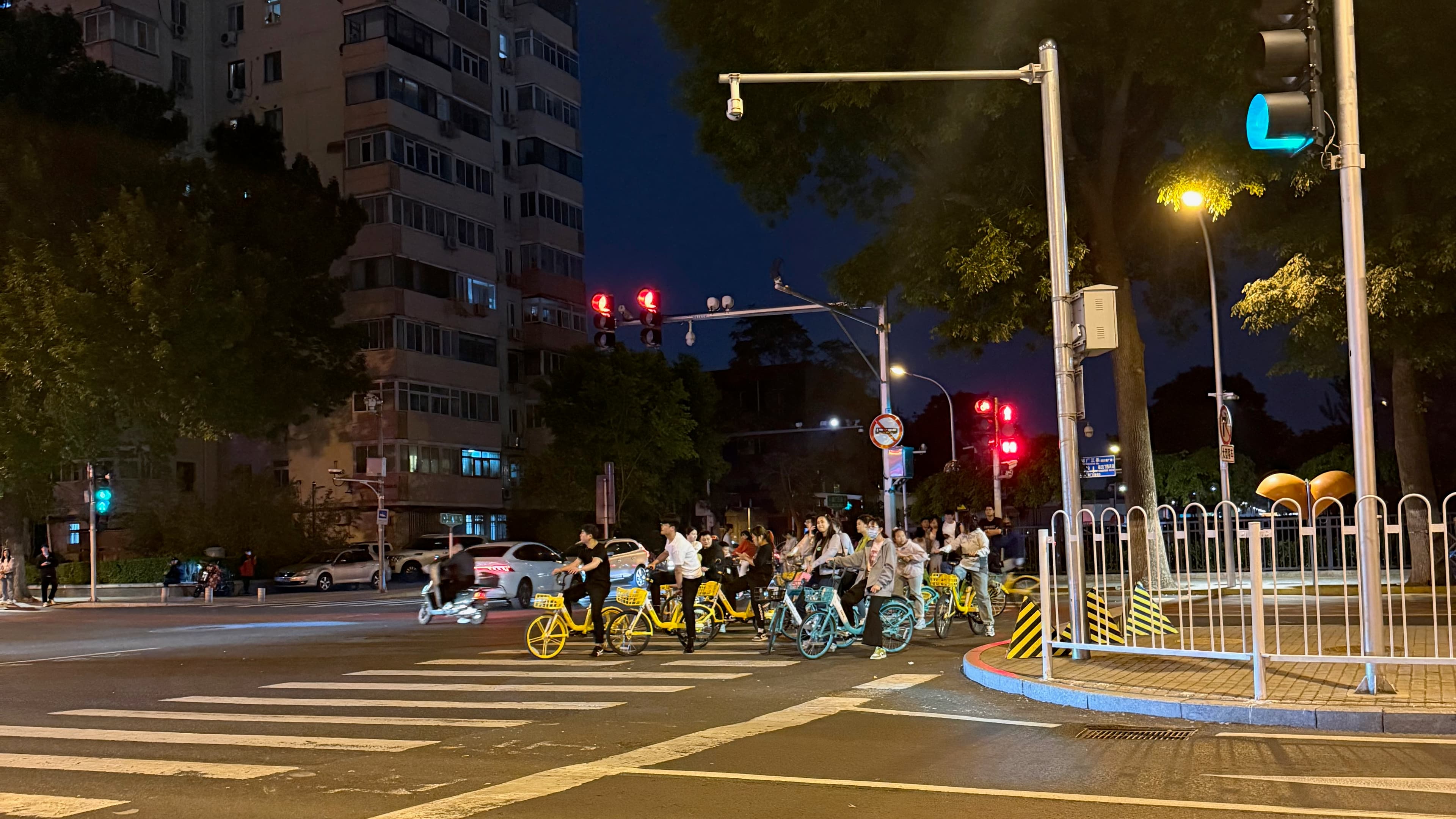 The quiet, modern streets of Beijing filled with electric vehicles and bike shares.